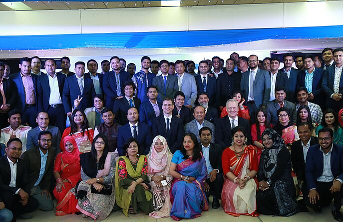 Group picture at testing lab in Dhaka, Bangladesh