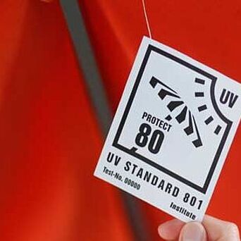 UV STANDARD 801 label on red umbrella