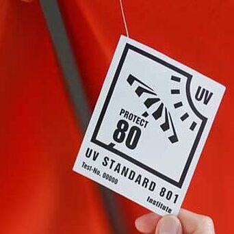 UV STANDARD 801 label on red umbrella