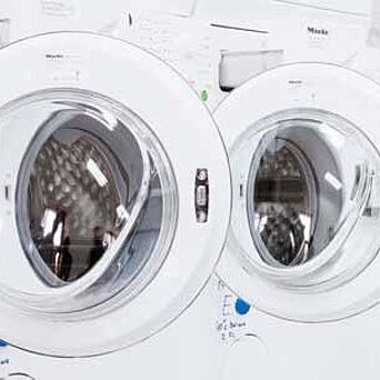 Row of home laundry machines in Hohenstein lab