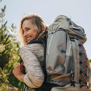 Woman hiking with backpack