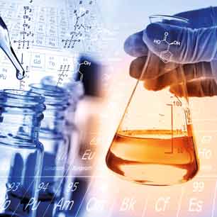 gloved hand holding chemical beaker with chemical formulas in the background