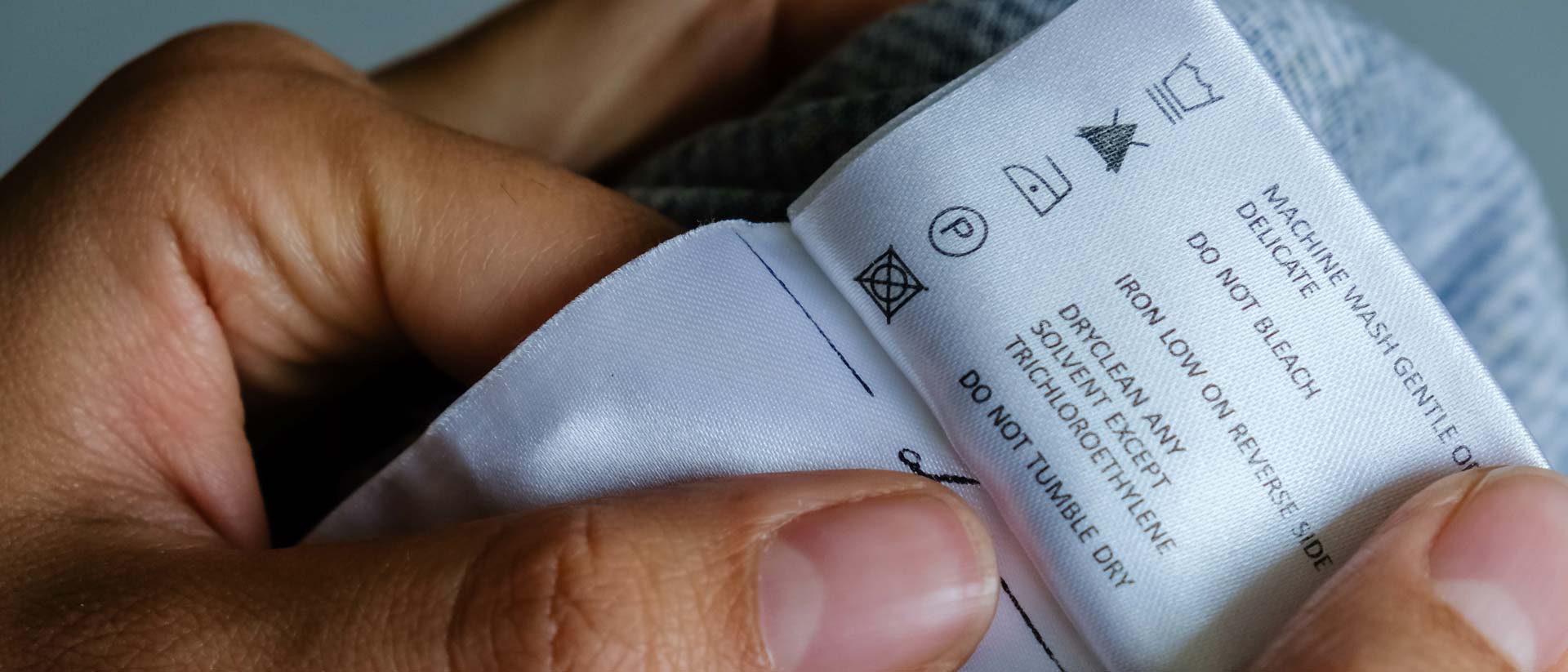 Fabric label sewn into product with care instructions