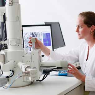 Hohenstein textile expert using scanning electron microscope