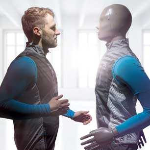 Man and testing manikin facing each other in same pose and same clothes