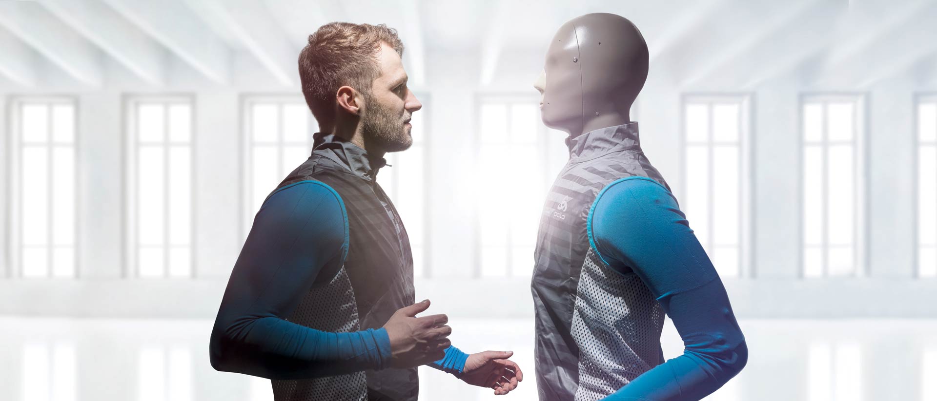 Man and thermal testing manikin dressed in the same garments