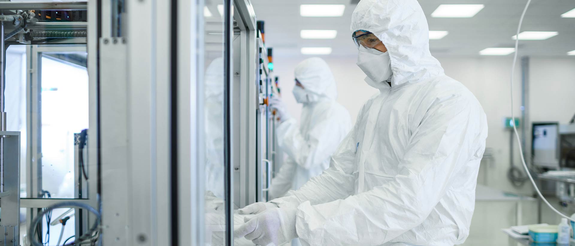 Lab workers wearing protective face masks