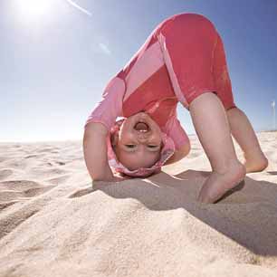 Child wearing swimsuit with certified ultraviolet protection factor (UPF)